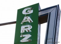 A neon sign that says "GARZ."